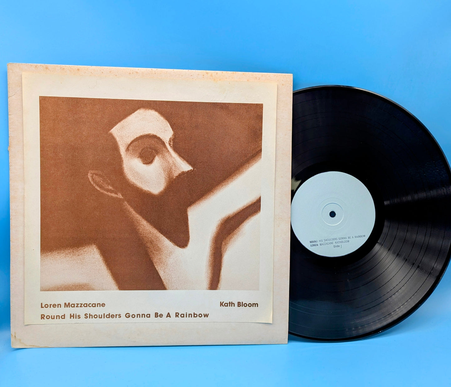 Mazzacane, Loren/Kath Bloom – Round His Shoulders Gonna Be A Rainbow (used)
